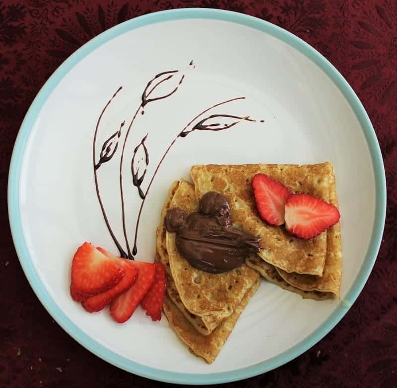 Crepes, Strawberries and Chocolate Nut Spread