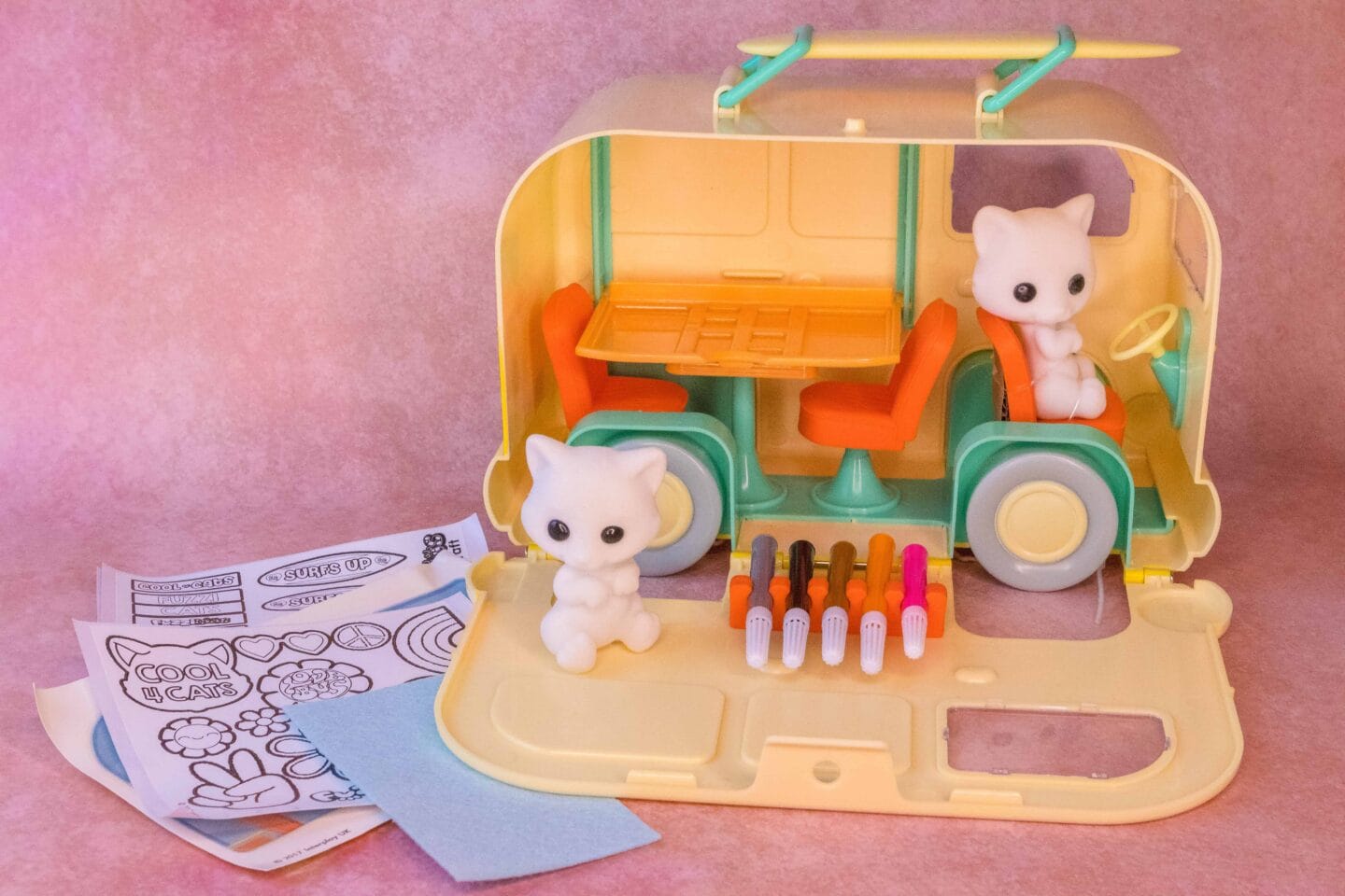 The Fuzzikins Camper Van is designed as activity craft set to help encourage creative and imaginative play. The camper van is also a handy carry case containing two Fuzzikins. You can even colour the cats and customise the van with the washable colouring pens and stickers provided. Inside there is plenty of space for the cats to enjoy a meal or have a quick cat-nap on the pull down bed.