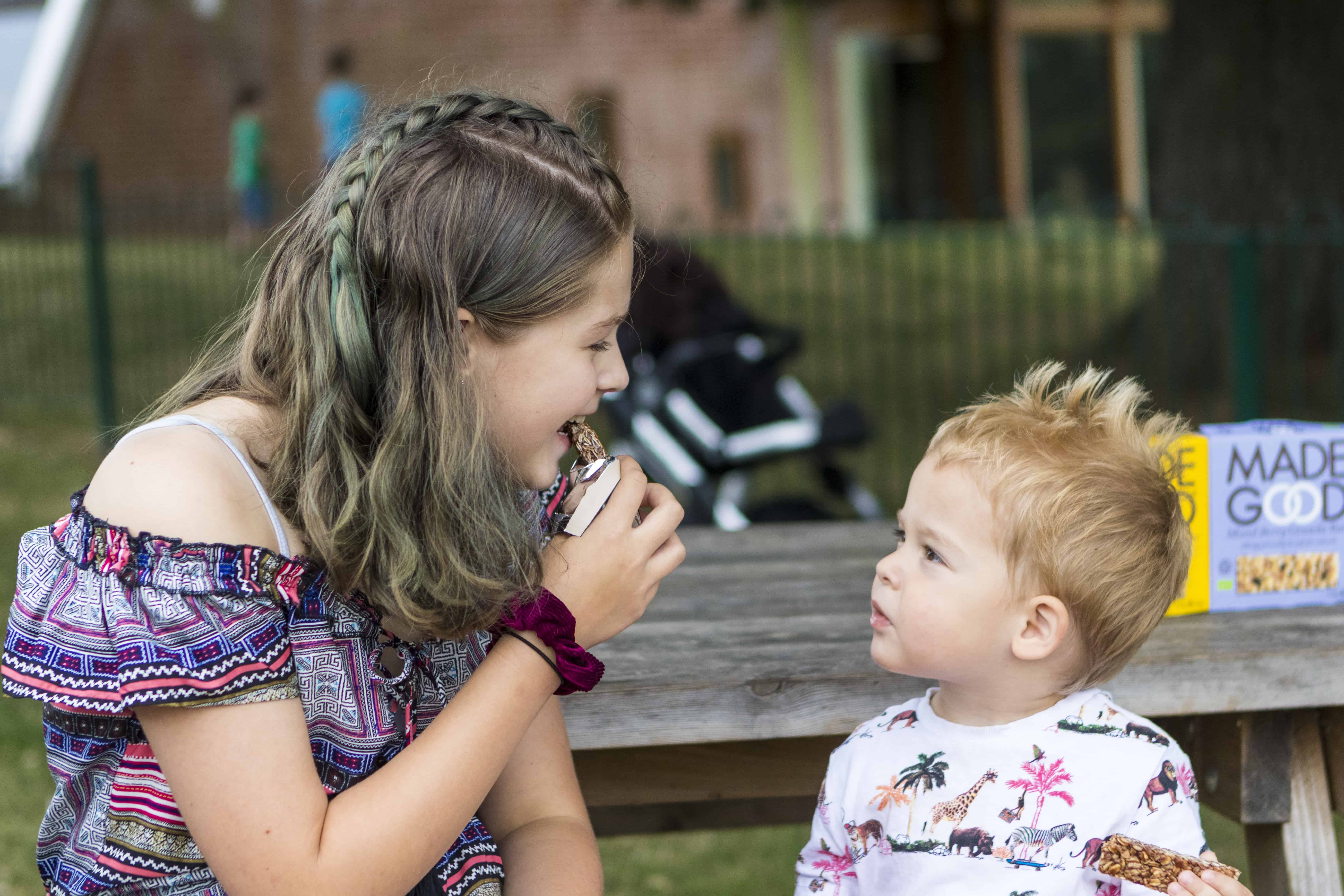 Children eating MadeGood bars