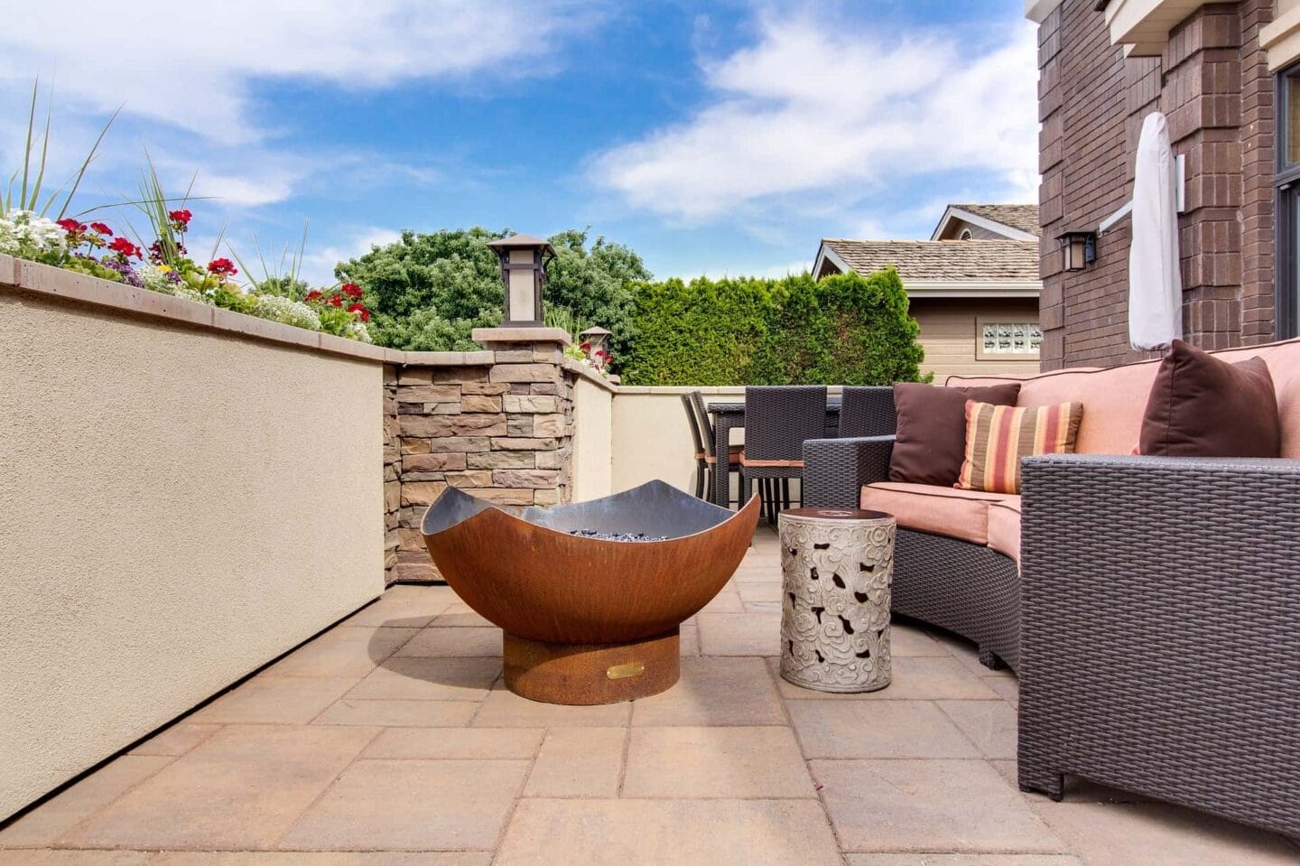 Firepit in the middle of a garden patio