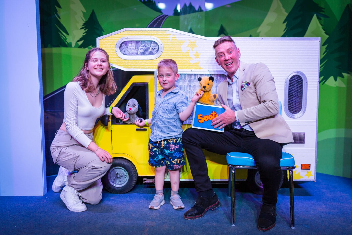 Two Children Meeting Sooty, Sweep and Richard at Sooty Land in Crealy Theme Park, Devon