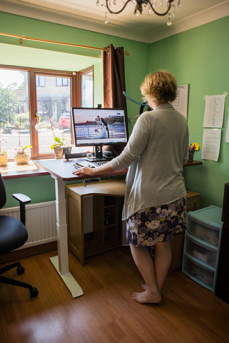 Me at the Flexispot Standing Desk, using it at standing height.