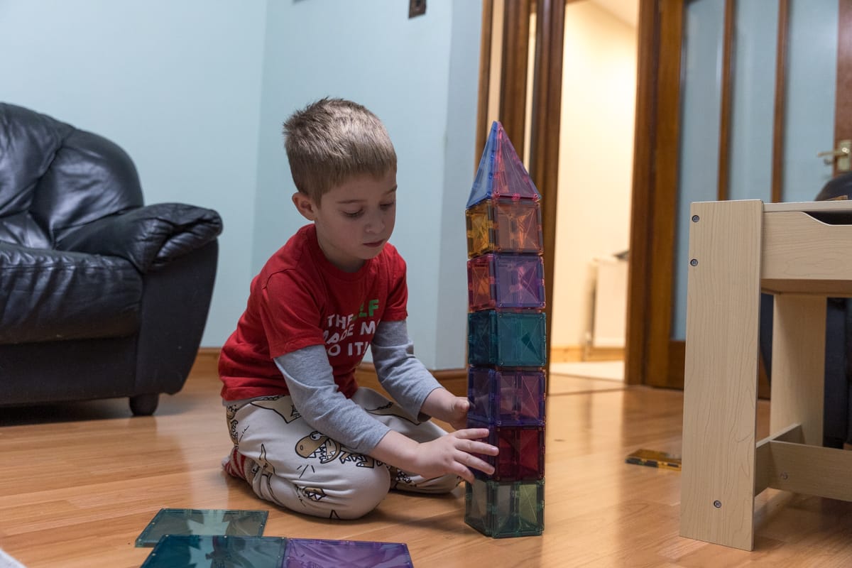 Connetix Magnetic Tiles Ideas for play and construction including a model of a tower.